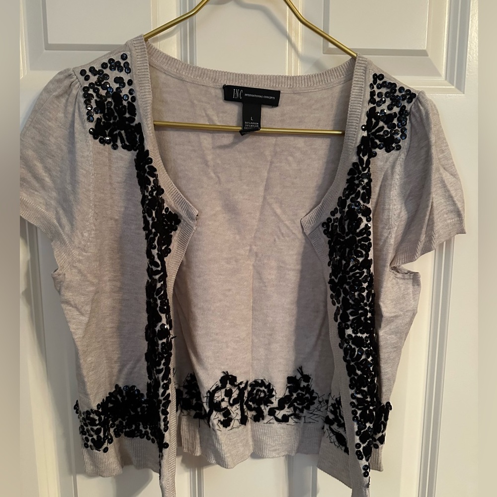 Chic tan and black shrug sweater